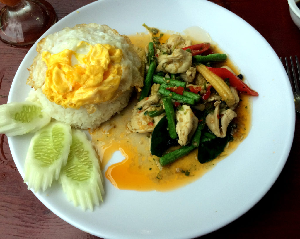 Traditional thai plate with rice and chicken