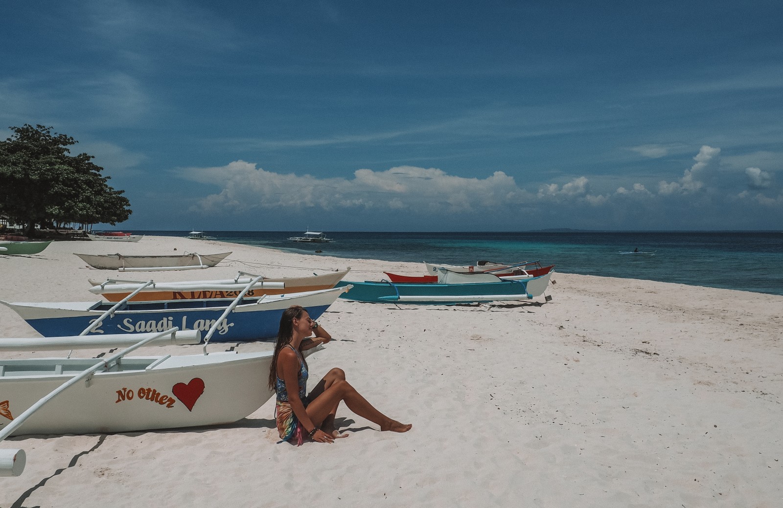 Girl on the Pamilacan island beach
