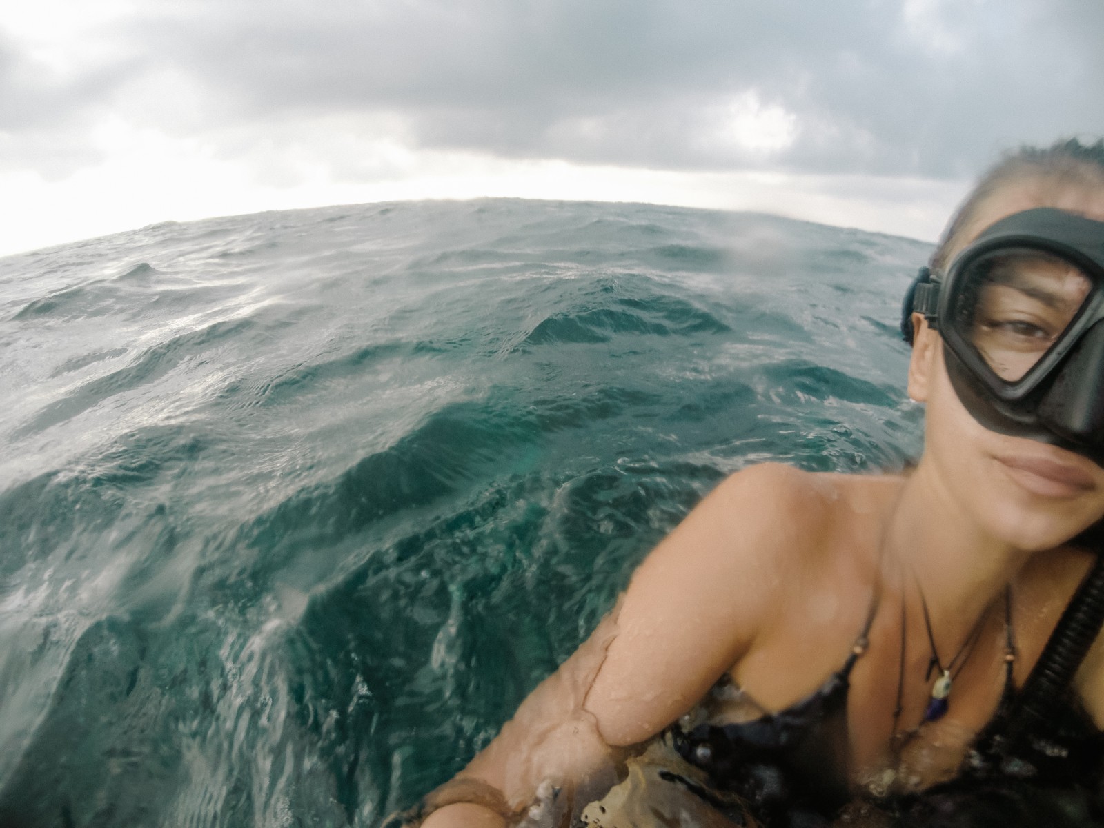 girl snorkeling in the ocean