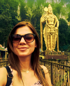 selfie with standing golden Buddha in batu caves