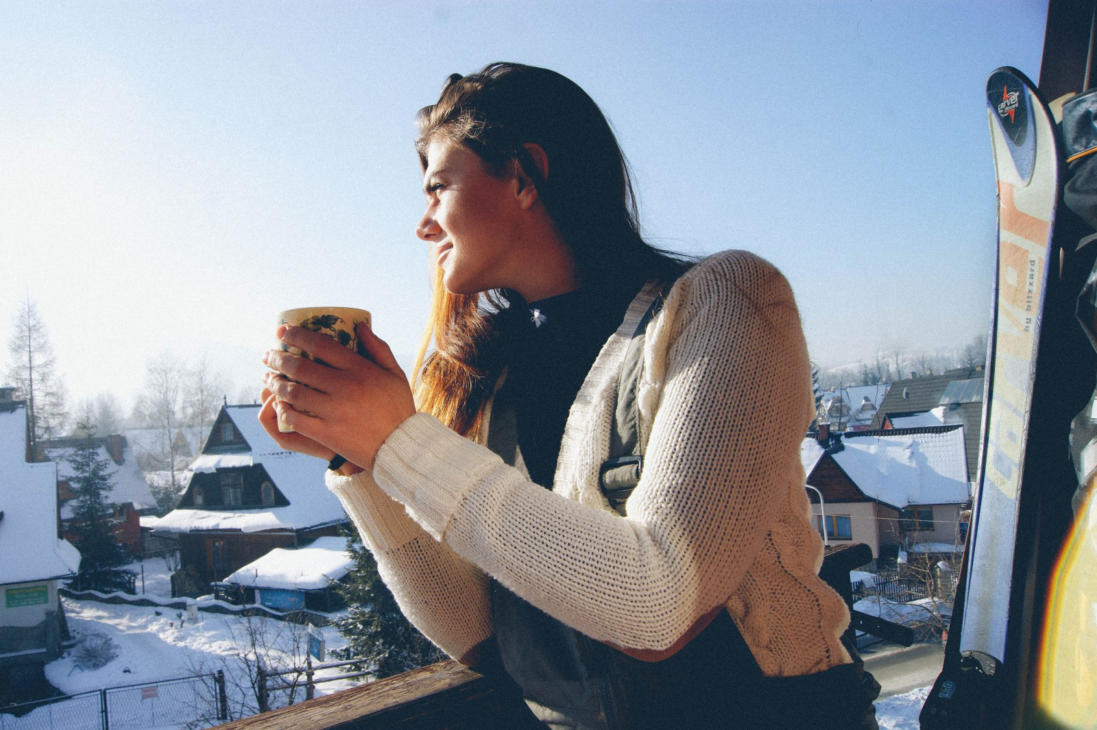 a girl drinking tea in the mountains